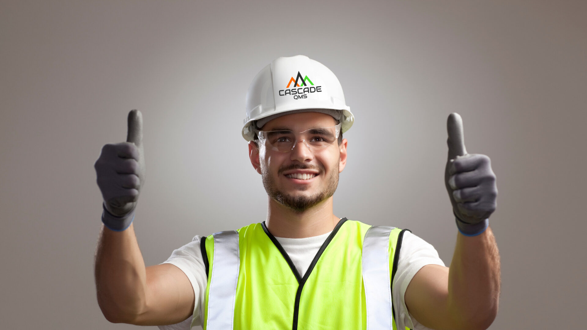 Safety Manager giving two thums up with cascade qms logo on hat at OSHA log completion