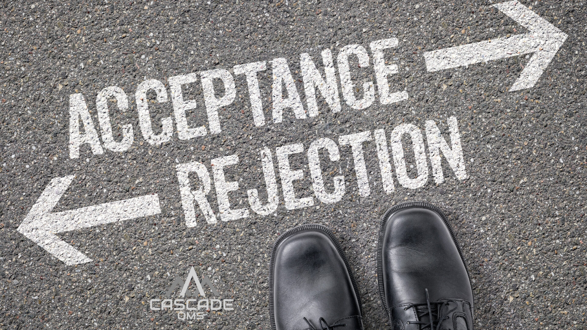 Aceeptance and Rejection written on pavement with cascade qms logo for vero