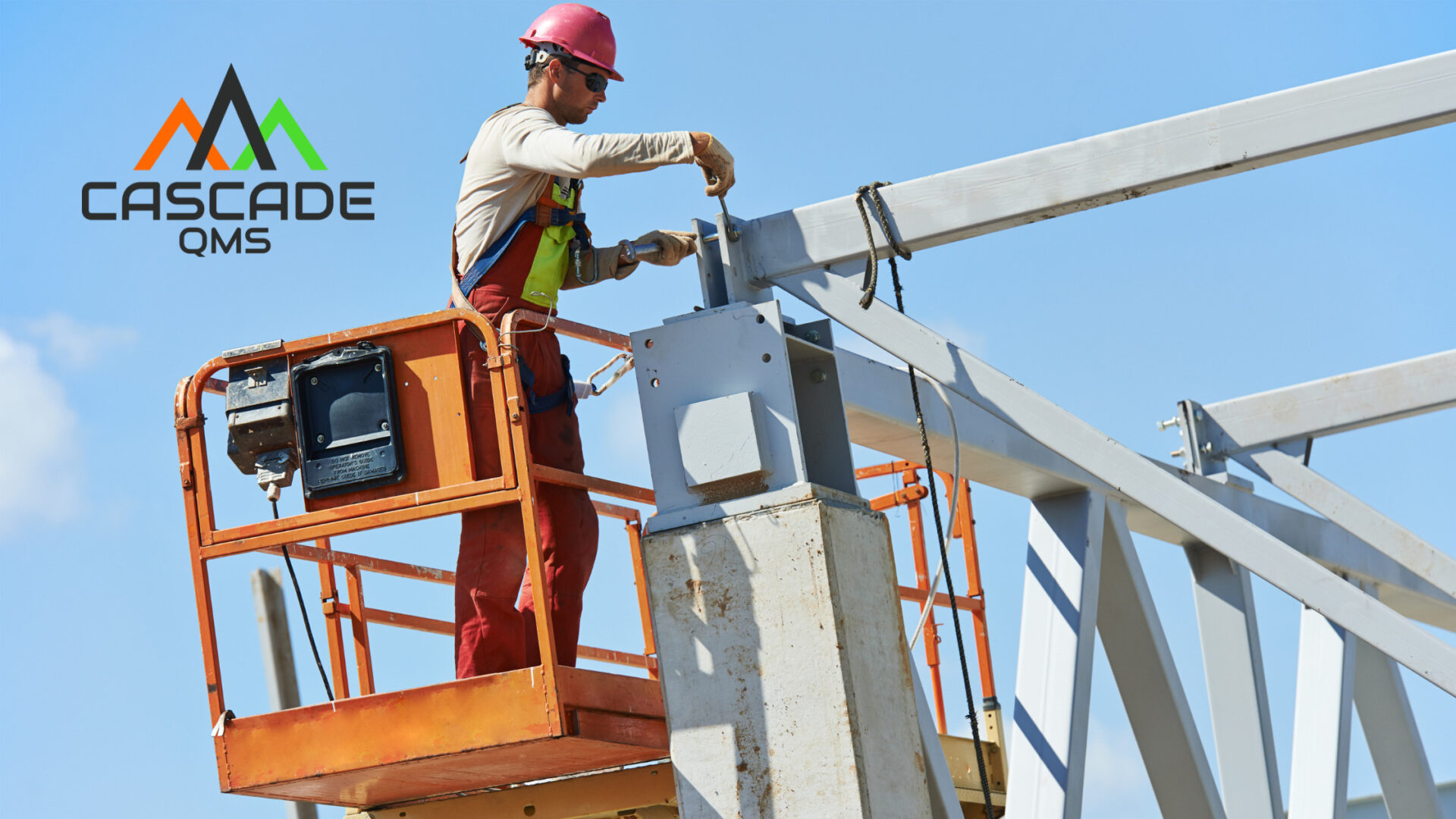 millwright on aerial lift with cascade qms logo